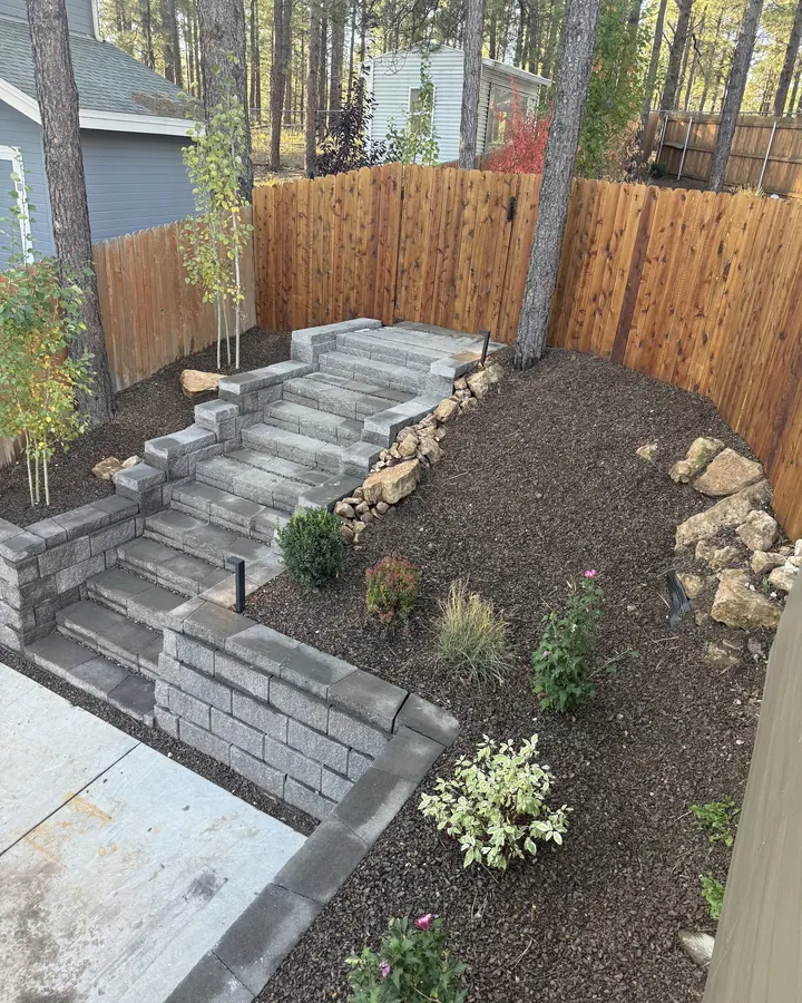 Paver steps and retaining walls with new plantings
