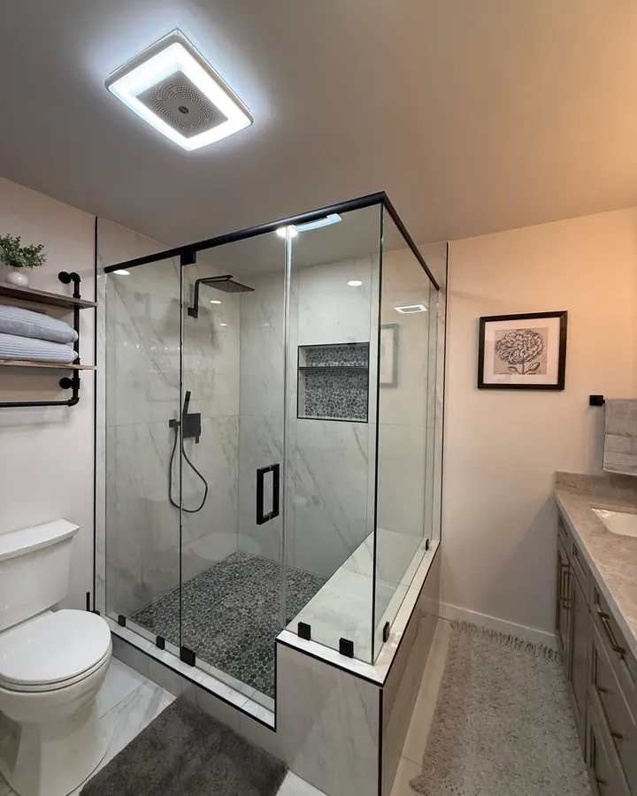 Bathroom remodel with a glass walk-in shower