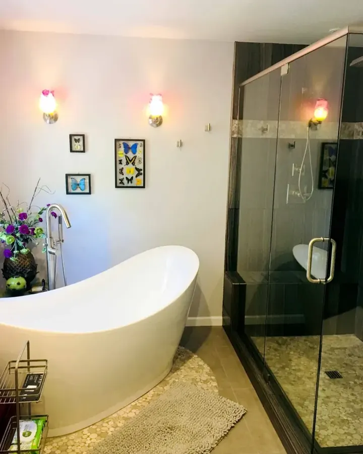 Bathroom with a freestanding tub and glass shower